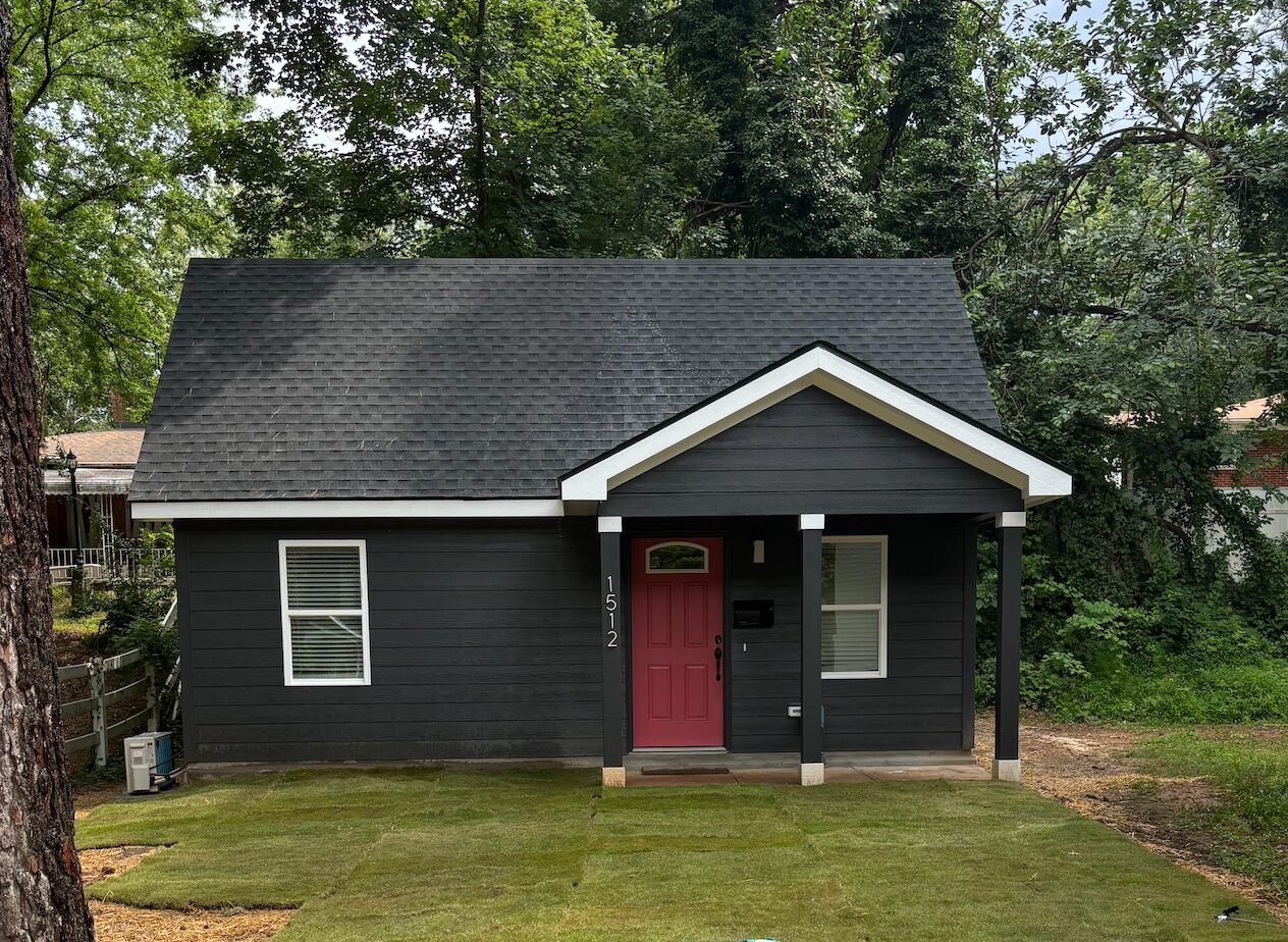 Charcoal accessory dwelling unit with a red front door